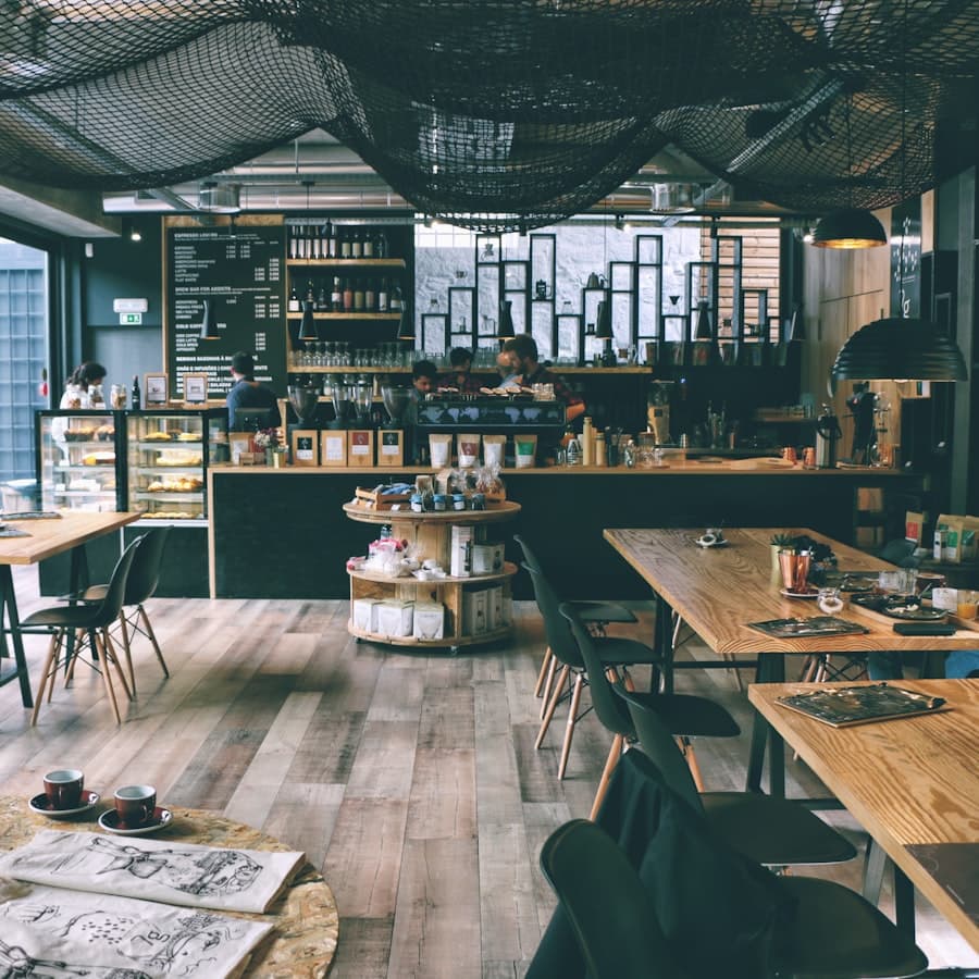 Long wooden tables running the length of the café at midday