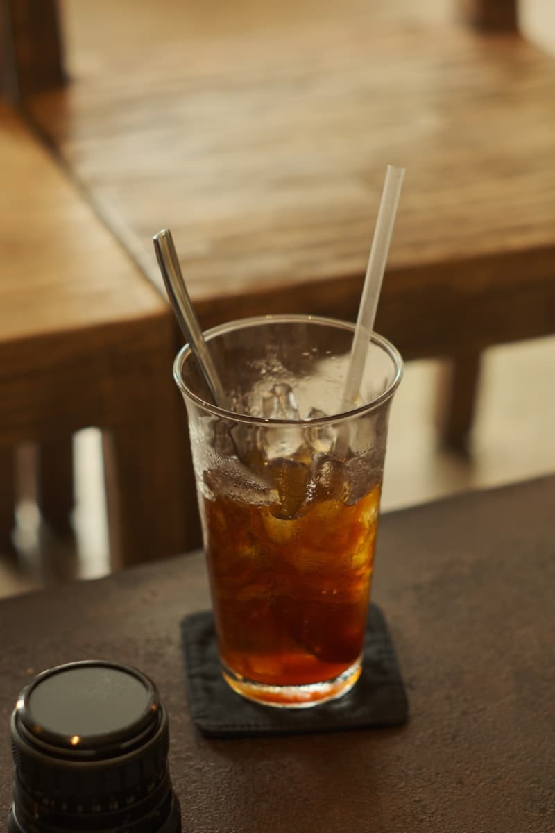 Cold brew coffee poured over ice in a tall glass